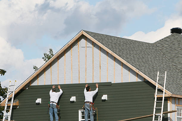 Professional Siding Installation technician working in Fredericksburg, VA